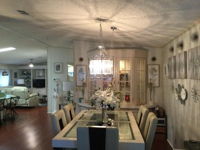 ONE OF THE LARGEST HOMES IN THIS COMMUNITY. THIS 1560 SF HOME IS on Spanish Lakes I in Florida - for sale on GolfHomes.com, golf home, golf lot