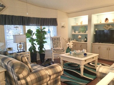 ONE OF THE LARGEST HOMES IN THIS COMMUNITY. THIS 1560 SF HOME IS on Spanish Lakes I in Florida - for sale on GolfHomes.com, golf home, golf lot