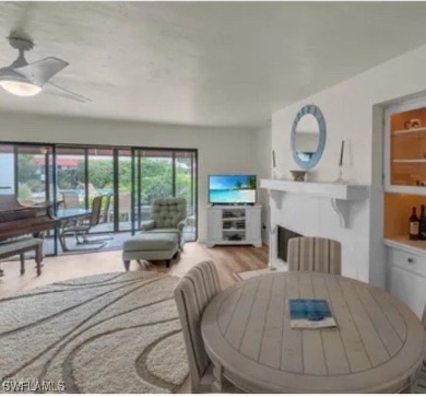 This charming first floor garden-style condominium located in on Club at Pelican Bay Golf Course in Florida - for sale on GolfHomes.com, golf home, golf lot