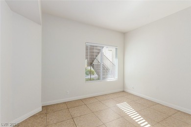 MOVE IN READY, FIRST FLOOR UNIT. Easy access to golf at Painted on Painted Desert Golf Club in Nevada - for sale on GolfHomes.com, golf home, golf lot