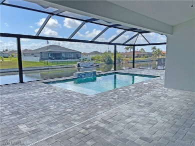 Enjoy the view of the canal and your pool from the lanai in your on Burnt Store Golf Club in Florida - for sale on GolfHomes.com, golf home, golf lot