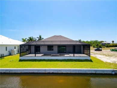 Enjoy the view of the canal and your pool from the lanai in your on Burnt Store Golf Club in Florida - for sale on GolfHomes.com, golf home, golf lot