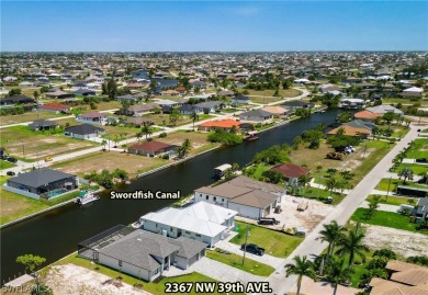 Enjoy the view of the canal and your pool from the lanai in your on Burnt Store Golf Club in Florida - for sale on GolfHomes.com, golf home, golf lot