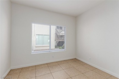 MOVE IN READY, FIRST FLOOR UNIT. Easy access to golf at Painted on Painted Desert Golf Club in Nevada - for sale on GolfHomes.com, golf home, golf lot