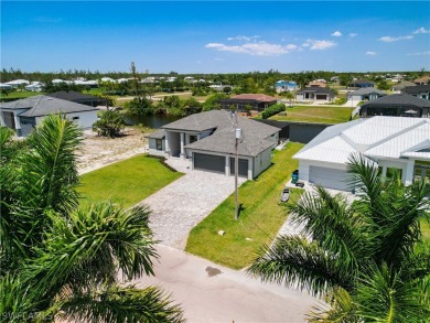 Enjoy the view of the canal and your pool from the lanai in your on Burnt Store Golf Club in Florida - for sale on GolfHomes.com, golf home, golf lot