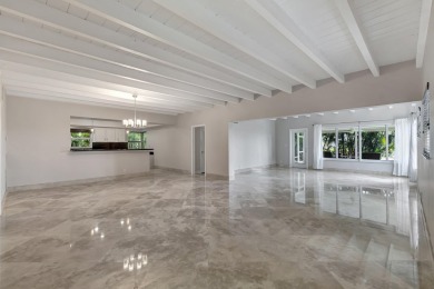 Upon entry, The WOW factor is immediate!  This is a home you on Lake Worth Municipal Golf Course in Florida - for sale on GolfHomes.com, golf home, golf lot