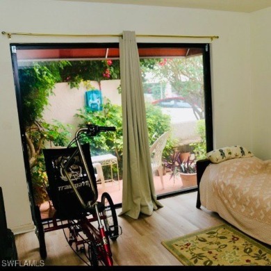 This charming first floor garden-style condominium located in on Club at Pelican Bay Golf Course in Florida - for sale on GolfHomes.com, golf home, golf lot