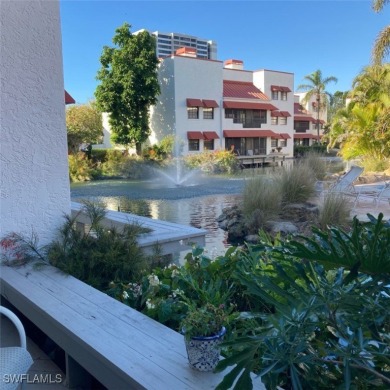 This charming first floor garden-style condominium located in on Club at Pelican Bay Golf Course in Florida - for sale on GolfHomes.com, golf home, golf lot