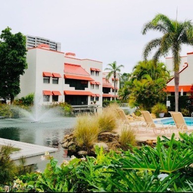 This charming first floor garden-style condominium located in on Club at Pelican Bay Golf Course in Florida - for sale on GolfHomes.com, golf home, golf lot