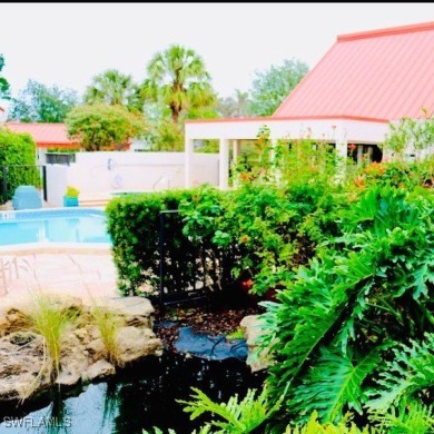 This charming first floor garden-style condominium located in on Club at Pelican Bay Golf Course in Florida - for sale on GolfHomes.com, golf home, golf lot