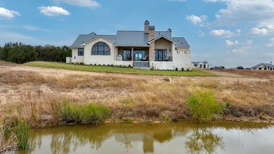 NEW CONSTRUCTION BY AGAVE CUSTOM HOMES! This gorgeous French on The Club At Comanche Trace in Texas - for sale on GolfHomes.com, golf home, golf lot