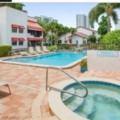 This charming first floor garden-style condominium located in on Club at Pelican Bay Golf Course in Florida - for sale on GolfHomes.com, golf home, golf lot