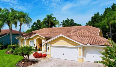 Nestled within the highly sought-after gated community of on East Lake Woodlands Country Club in Florida - for sale on GolfHomes.com, golf home, golf lot