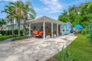 Escape to your secluded South Tampa sanctuary, where mornings on Palma Ceia Golf and Country Club in Florida - for sale on GolfHomes.com, golf home, golf lot