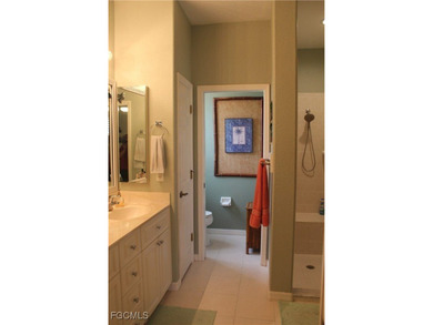 Discover unparalleled Florida living in this beautifully on Herons Glen Golf and Country Club in Florida - for sale on GolfHomes.com, golf home, golf lot