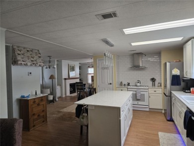 2-Bedroom, 2 Bath home located in the PET FRIENDLY area of on Zellwood Station Country Club in Florida - for sale on GolfHomes.com, golf home, golf lot