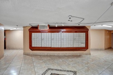 Spacious 2 bed, 2 bath condo with a private balcony and golf on Inverrary Country Club in Florida - for sale on GolfHomes.com, golf home, golf lot