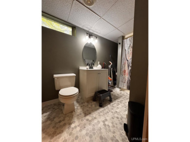 Beautiful three-bedroom,(with a 4th non conventional)two-bath on Ontonagon Golf Course in Michigan - for sale on GolfHomes.com, golf home, golf lot