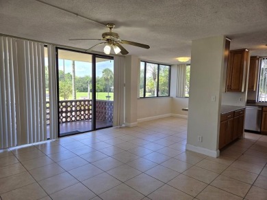 Spacious 2 bed, 2 bath condo with a private balcony and golf on Inverrary Country Club in Florida - for sale on GolfHomes.com, golf home, golf lot