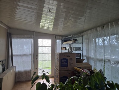 2-Bedroom, 2 Bath home located in the PET FRIENDLY area of on Zellwood Station Country Club in Florida - for sale on GolfHomes.com, golf home, golf lot