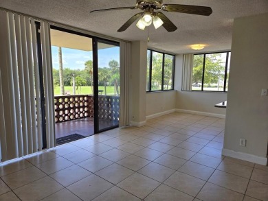 Spacious 2 bed, 2 bath condo with a private balcony and golf on Inverrary Country Club in Florida - for sale on GolfHomes.com, golf home, golf lot