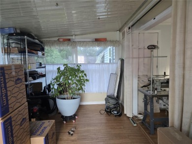 2-Bedroom, 2 Bath home located in the PET FRIENDLY area of on Zellwood Station Country Club in Florida - for sale on GolfHomes.com, golf home, golf lot