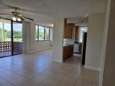 Spacious 2 bed, 2 bath condo with a private balcony and golf on Inverrary Country Club in Florida - for sale on GolfHomes.com, golf home, golf lot