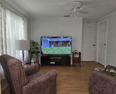 2-Bedroom, 2 Bath home located in the PET FRIENDLY area of on Zellwood Station Country Club in Florida - for sale on GolfHomes.com, golf home, golf lot