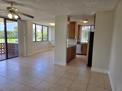 Spacious 2 bed, 2 bath condo with a private balcony and golf on Inverrary Country Club in Florida - for sale on GolfHomes.com, golf home, golf lot