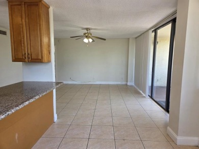Spacious 2 bed, 2 bath condo with a private balcony and golf on Inverrary Country Club in Florida - for sale on GolfHomes.com, golf home, golf lot