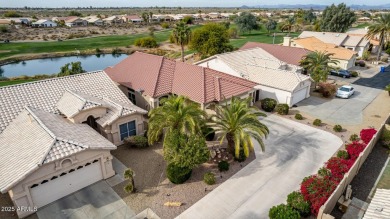 Nestled on the picturesque 15th tee box of Coyote Lakes Golf on Coyote Lakes Golf Club in Arizona - for sale on GolfHomes.com, golf home, golf lot