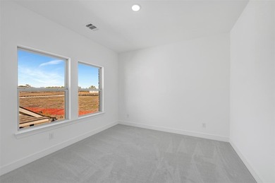 Fabulous two-story home located at Heath Golf and Yacht Club in on Heath Golf and Yacht Club in Texas - for sale on GolfHomes.com, golf home, golf lot