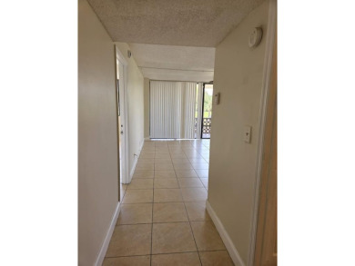 Spacious 2 bed, 2 bath condo with a private balcony and golf on Inverrary Country Club in Florida - for sale on GolfHomes.com, golf home, golf lot