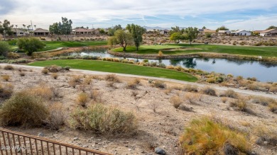 Nestled on the picturesque 15th tee box of Coyote Lakes Golf on Coyote Lakes Golf Club in Arizona - for sale on GolfHomes.com, golf home, golf lot