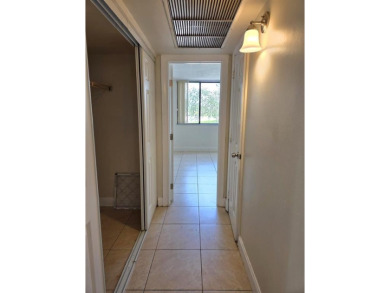 Spacious 2 bed, 2 bath condo with a private balcony and golf on Inverrary Country Club in Florida - for sale on GolfHomes.com, golf home, golf lot