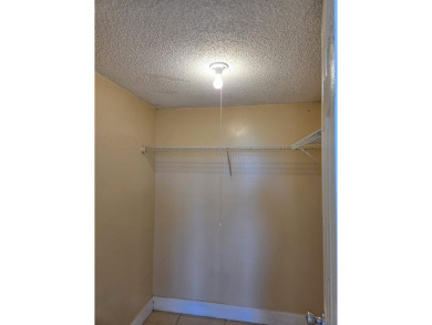 Spacious 2 bed, 2 bath condo with a private balcony and golf on Inverrary Country Club in Florida - for sale on GolfHomes.com, golf home, golf lot