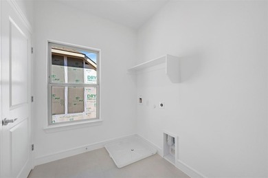 Fabulous two-story home located at Heath Golf and Yacht Club in on Heath Golf and Yacht Club in Texas - for sale on GolfHomes.com, golf home, golf lot