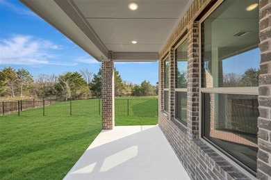 Fabulous two-story home located at Heath Golf and Yacht Club in on Heath Golf and Yacht Club in Texas - for sale on GolfHomes.com, golf home, golf lot