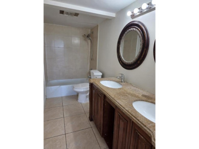 Spacious 2 bed, 2 bath condo with a private balcony and golf on Inverrary Country Club in Florida - for sale on GolfHomes.com, golf home, golf lot