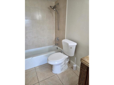 Spacious 2 bed, 2 bath condo with a private balcony and golf on Inverrary Country Club in Florida - for sale on GolfHomes.com, golf home, golf lot