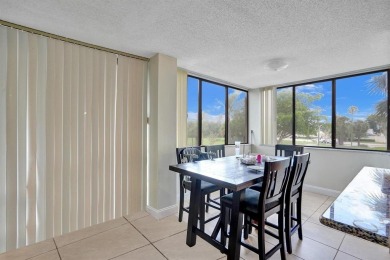 Spacious 2 bed, 2 bath condo with a private balcony and golf on Inverrary Country Club in Florida - for sale on GolfHomes.com, golf home, golf lot
