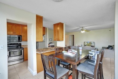 Spacious 2 bed, 2 bath condo with a private balcony and golf on Inverrary Country Club in Florida - for sale on GolfHomes.com, golf home, golf lot