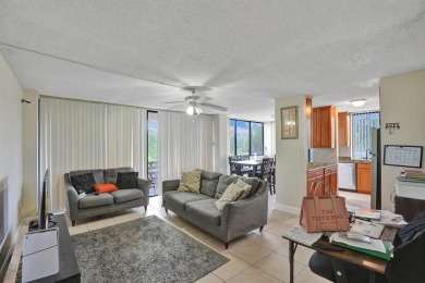 Spacious 2 bed, 2 bath condo with a private balcony and golf on Inverrary Country Club in Florida - for sale on GolfHomes.com, golf home, golf lot