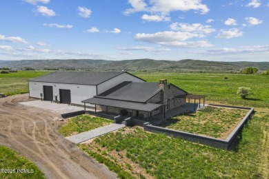 Nestled on a sprawling 5.86-acre lot surrounded by the serene on Victory Ranch Golf Club in Utah - for sale on GolfHomes.com, golf home, golf lot