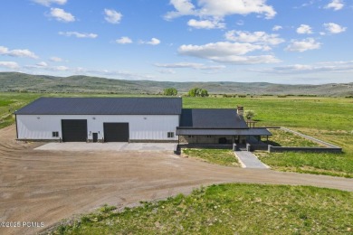 Nestled on a sprawling 5.86-acre lot surrounded by the serene on Victory Ranch Golf Club in Utah - for sale on GolfHomes.com, golf home, golf lot