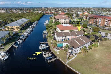 STUNNING WATERFRONT TOWNHOME IN PGI W/DEEDED DOCK - Discover the on Saint Andrews South Golf Club in Florida - for sale on GolfHomes.com, golf home, golf lot