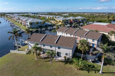 STUNNING WATERFRONT TOWNHOME IN PGI W/DEEDED DOCK - Discover the on Saint Andrews South Golf Club in Florida - for sale on GolfHomes.com, golf home, golf lot