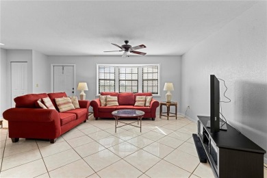 STUNNING WATERFRONT TOWNHOME IN PGI W/DEEDED DOCK - Discover the on Saint Andrews South Golf Club in Florida - for sale on GolfHomes.com, golf home, golf lot