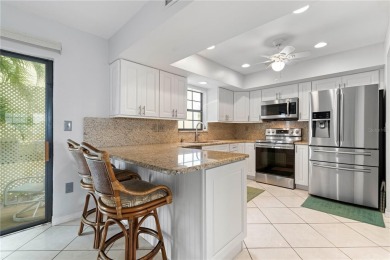 STUNNING WATERFRONT TOWNHOME IN PGI W/DEEDED DOCK - Discover the on Saint Andrews South Golf Club in Florida - for sale on GolfHomes.com, golf home, golf lot