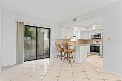 STUNNING WATERFRONT TOWNHOME IN PGI W/DEEDED DOCK - Discover the on Saint Andrews South Golf Club in Florida - for sale on GolfHomes.com, golf home, golf lot